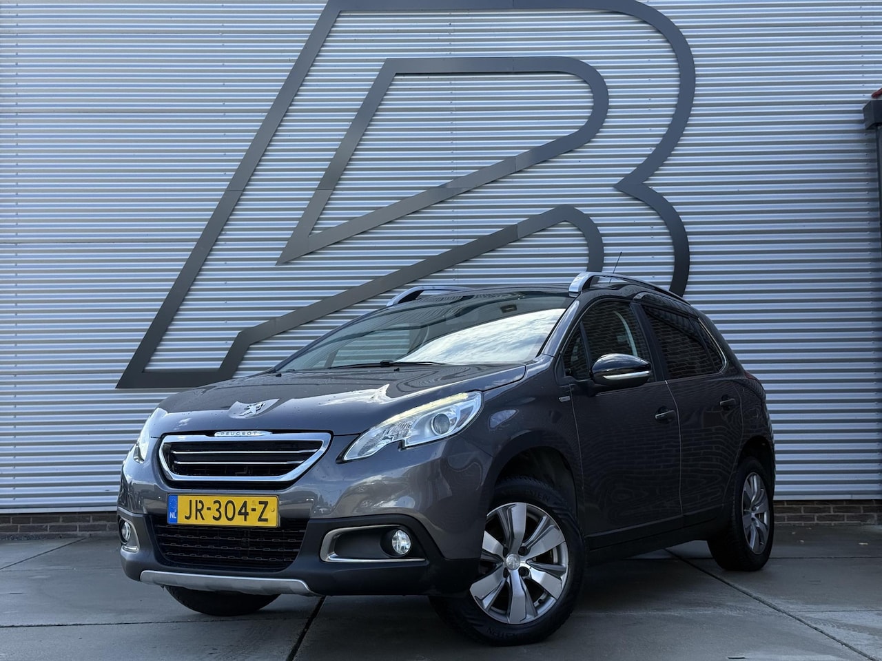 Peugeot 2008 - 1.2 PureTech Urban Cross Navi|Airco|Trekhaak|Cruise|PDC|Elek ramen|N.A.P|APK tot 14-09-202 - AutoWereld.nl