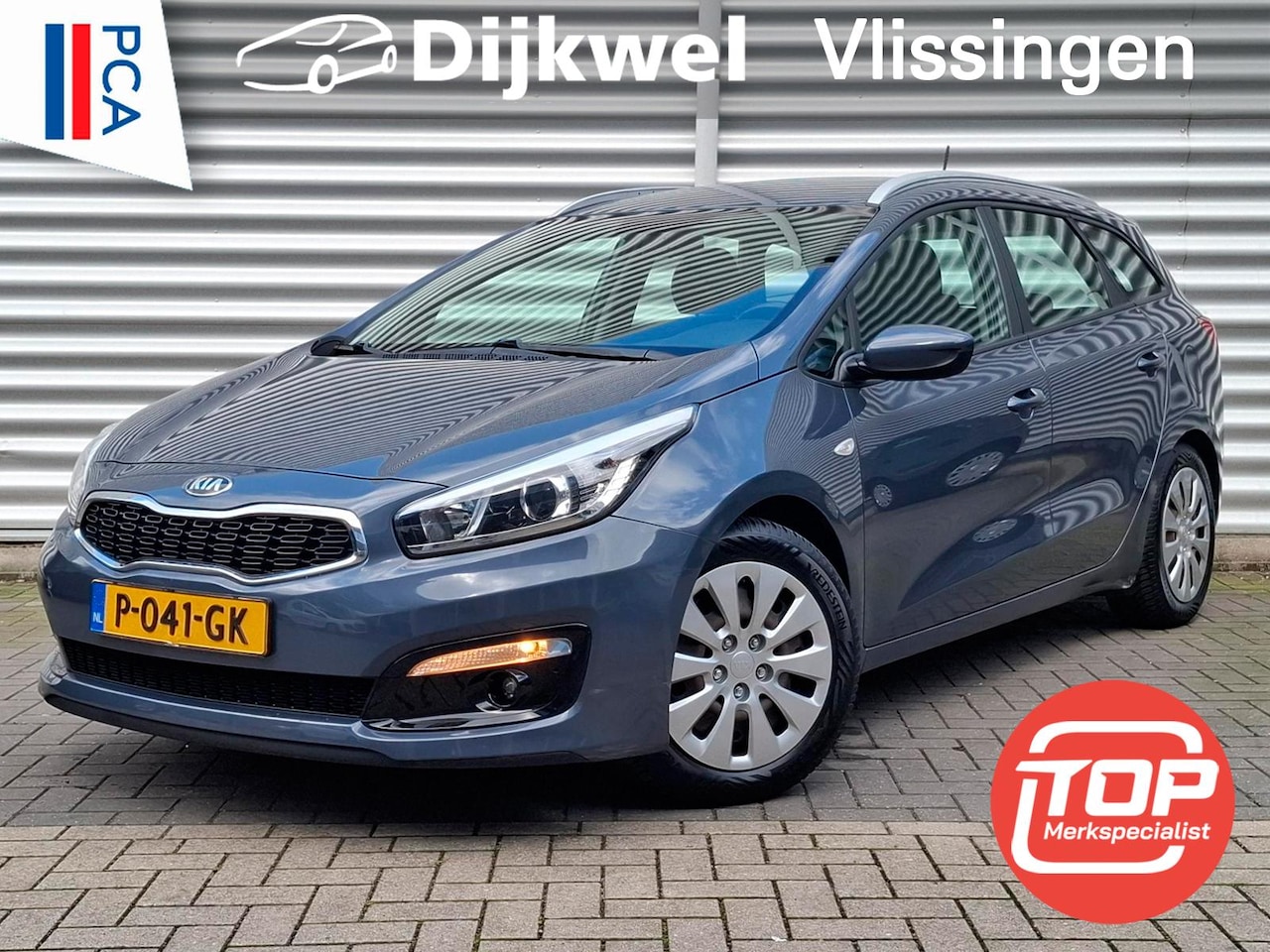 Kia Cee'd Sportswagon - 1.4 GDi Navigator Airco/Nav/Cam - AutoWereld.nl
