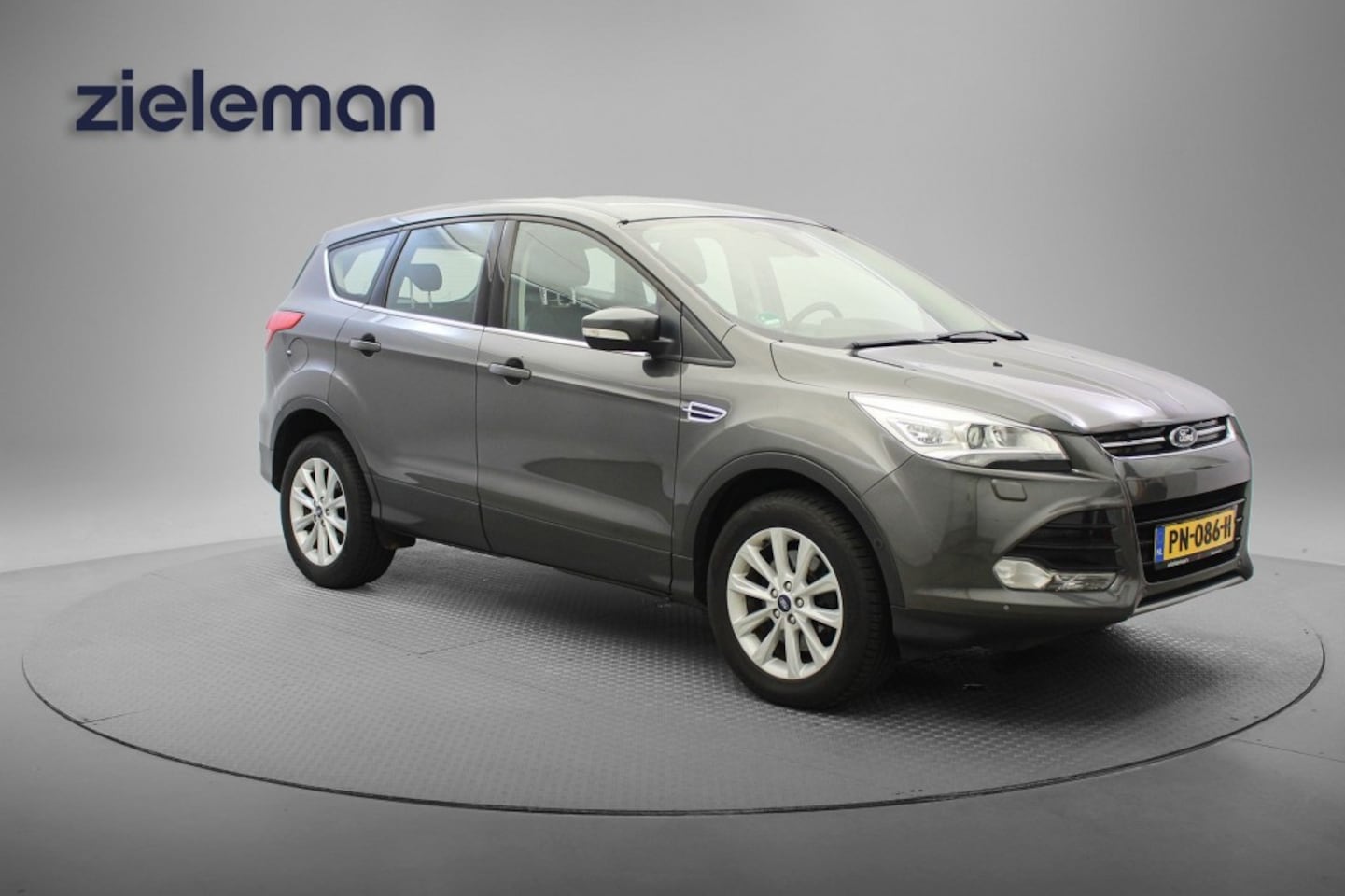 Ford Kuga - 1.5 Titanium 4WD Automaat - Navi, Clima, Half Leer, Trekhaak - AutoWereld.nl