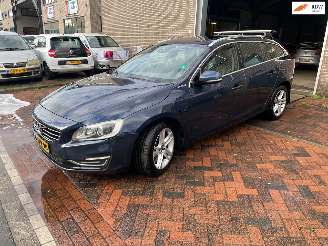 Volvo V60 - 2.4 D6 AWD Plug-In Hybrid Summum! Motor error! - AutoWereld.nl
