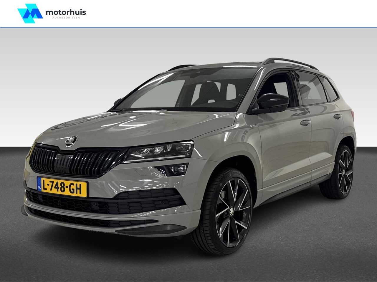 Skoda Karoq - 1.5 TSI ACT Sportline Business | Achteruitrijcamera | Apple Carplay/Android Auto|telefooni - AutoWereld.nl
