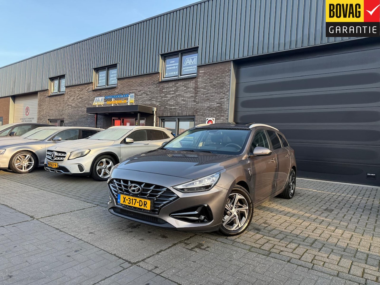 Hyundai i30 Wagon - 1.5 T-GDi MHEV Premium | 1E EIGENAAR | 3/6/12MND GARANTIE| LED | CARPLAY | SCHUIFDAK | DAB - AutoWereld.nl