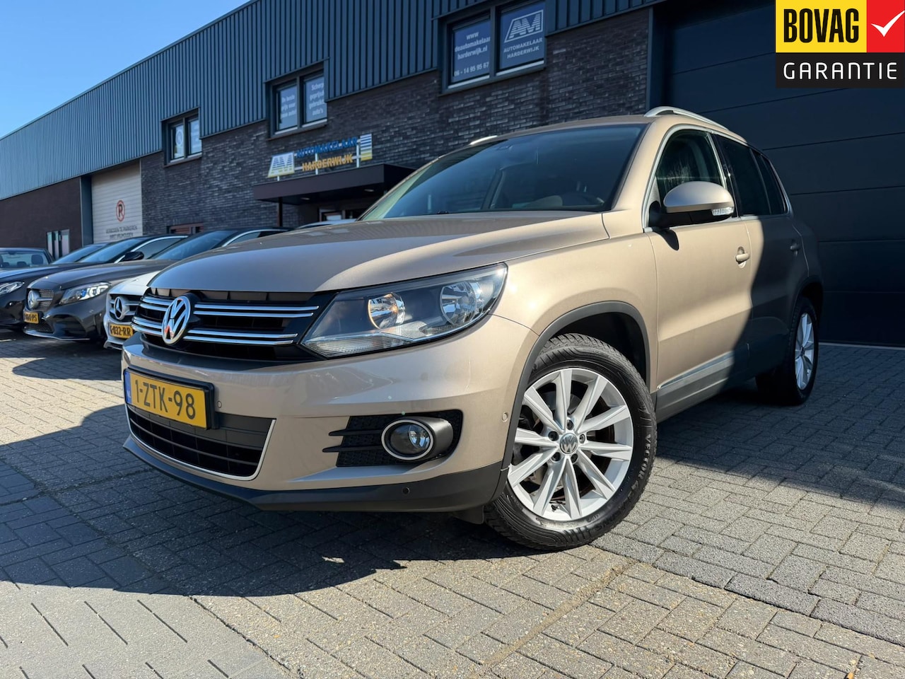Volkswagen Tiguan - 1.4 TSI Sport&Style | 1E EIGENAAR |3/6/12 MND GARANTIE | NAVI | PDC | TREKHAAK | NL AUTO | - AutoWereld.nl