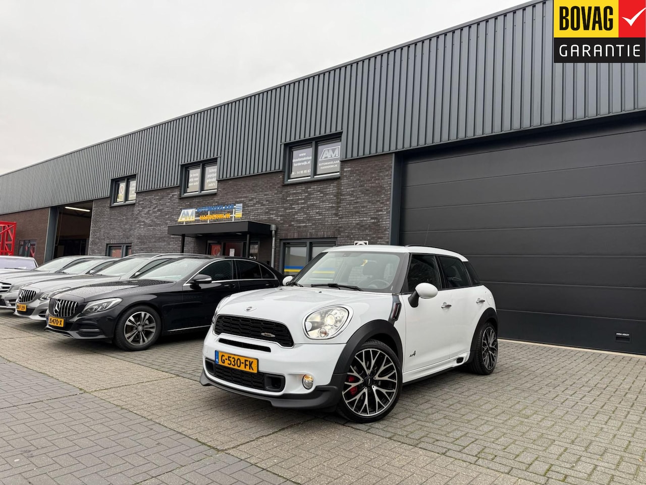 MINI John Cooper Works - Mini 1.6 | 1E EIGENAAR | 3/6/12MND GARANTIE | AUTOMAAT | JOHN WORKS | XENON | CRUISE | NAV - AutoWereld.nl
