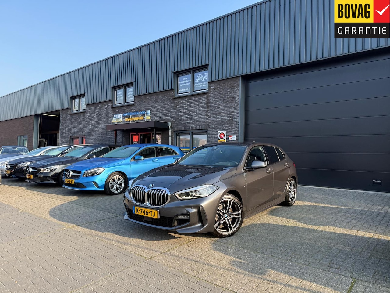 BMW 1-serie - 116d Executive | 1E EIGENAAR | 3/6/12MND GARANTIE | AUTOMAAT | LED | CARPLAY | SFEERVERLIC - AutoWereld.nl