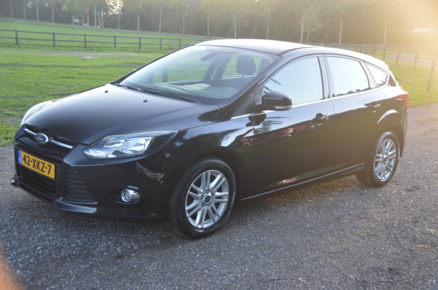 Ford Focus - 1.0 EcoB. Lease Ti. Clima Cruise PDC - AutoWereld.nl