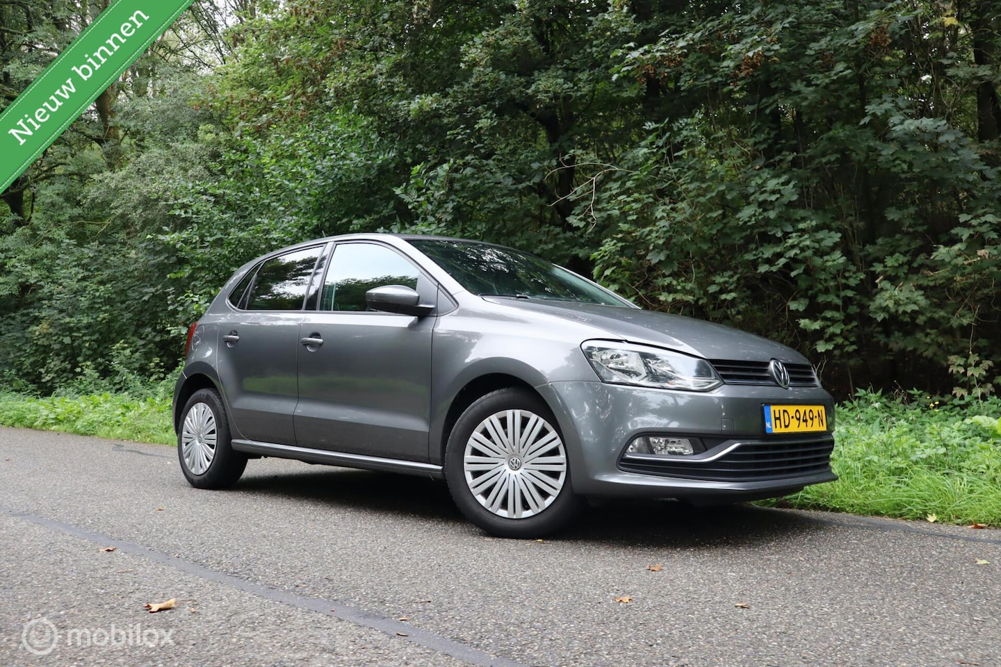 Volkswagen Polo - 1.4 TDI Comfortline | Start&Stop | NAV | AC - AutoWereld.nl