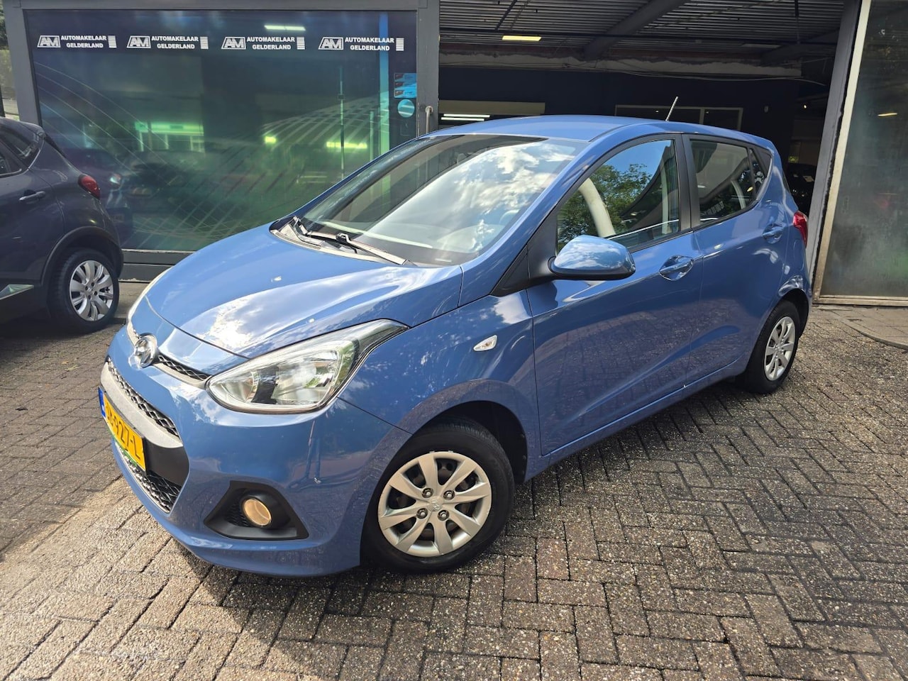 Hyundai i10 - 1.0i i-Motion Comfort | 2E EIGENAAR | 3\6 of 12MND GARANTIE | AIRCO | CRUISE | ELEC RAMEN - AutoWereld.nl