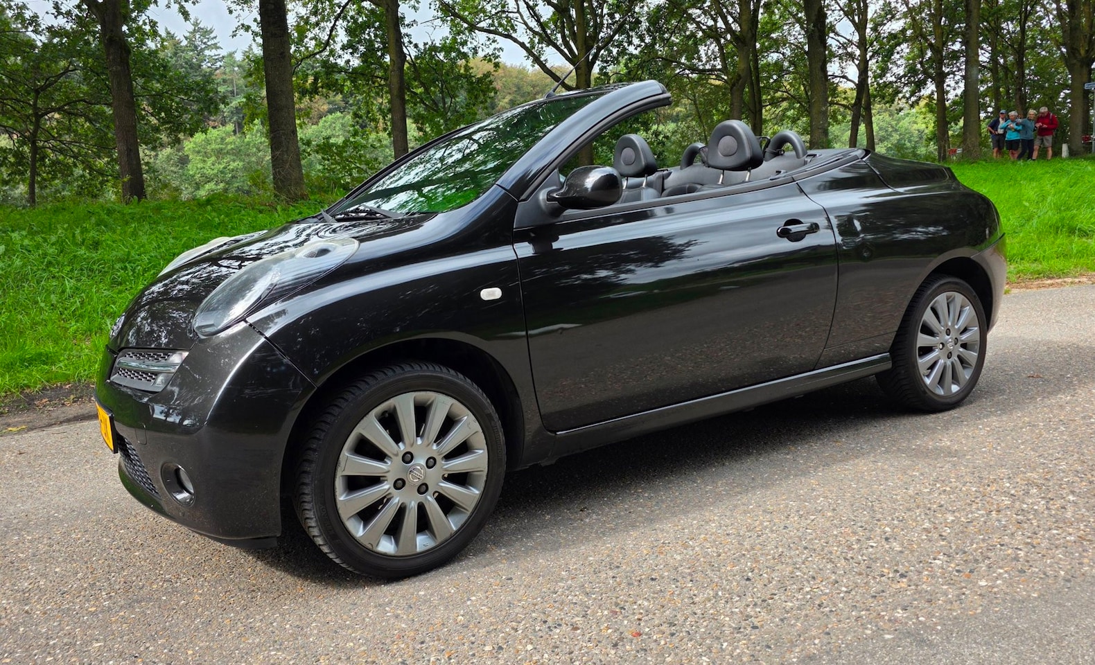 Nissan Micra C+C - 1.6 Tekna Plus - Airco - APK T/M 16-05-2027 - AutoWereld.nl