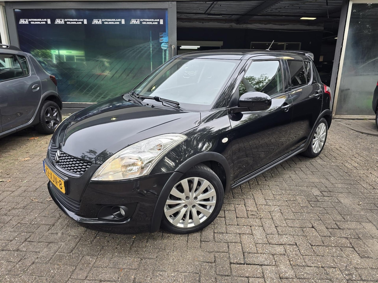 Suzuki Swift - 1.2 Exclusive EASSS | 1E EIGENAAR|3/6 OF 12MND GARANTIE | NIEUWE APK | LAGE KM | AIRCO | - AutoWereld.nl