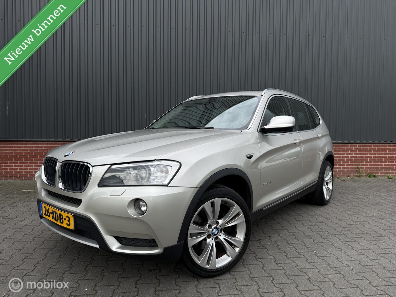 BMW X3 - xDrive20i High Executive Aut Panorama Xenon Cruise Leder Trekhaak NL Auto - AutoWereld.nl