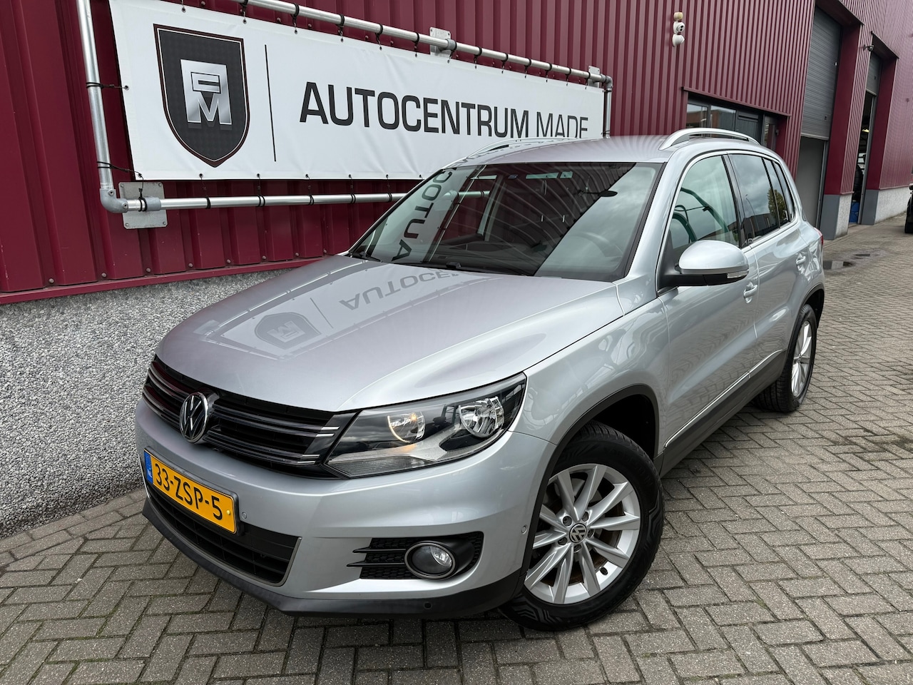 Volkswagen Tiguan - 1.4 TSI Sport&Style // Clima // PDC // Apple CarPlay // - AutoWereld.nl