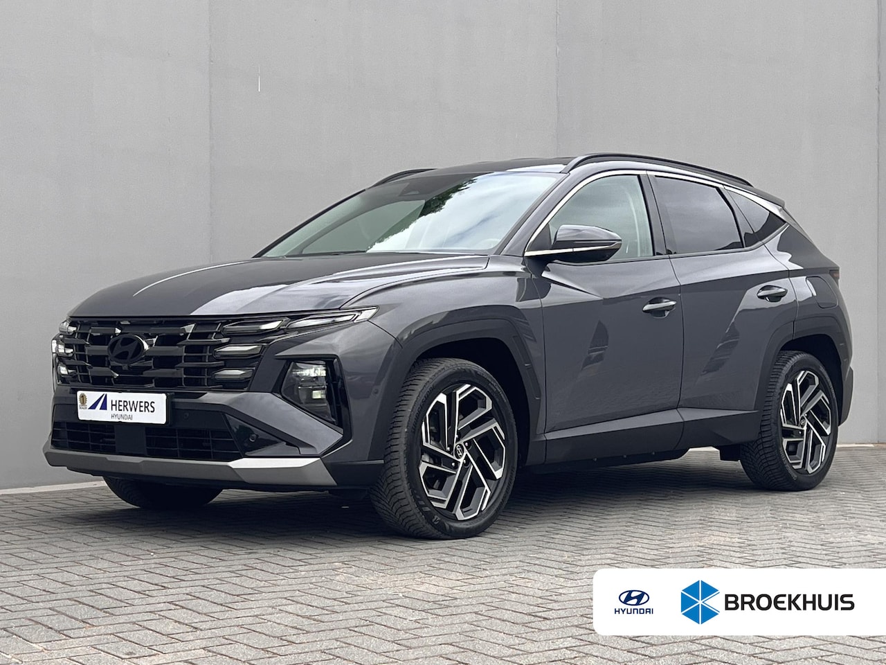 Hyundai Tucson - 1.6 T-GDI PHEV Premium 4WD / Accu SoH 100 % / EAER 65 km / Leder / HUD / Navigatie / Apple - AutoWereld.nl