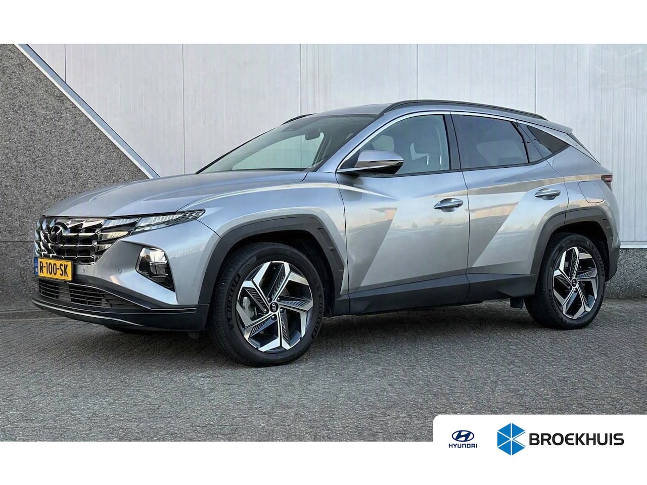 Hyundai Tucson - 1.6 T-GDI HEV Comfort / Navigatie / Camera / Parkeersensoren v + a / Climate Control / 19 - AutoWereld.nl