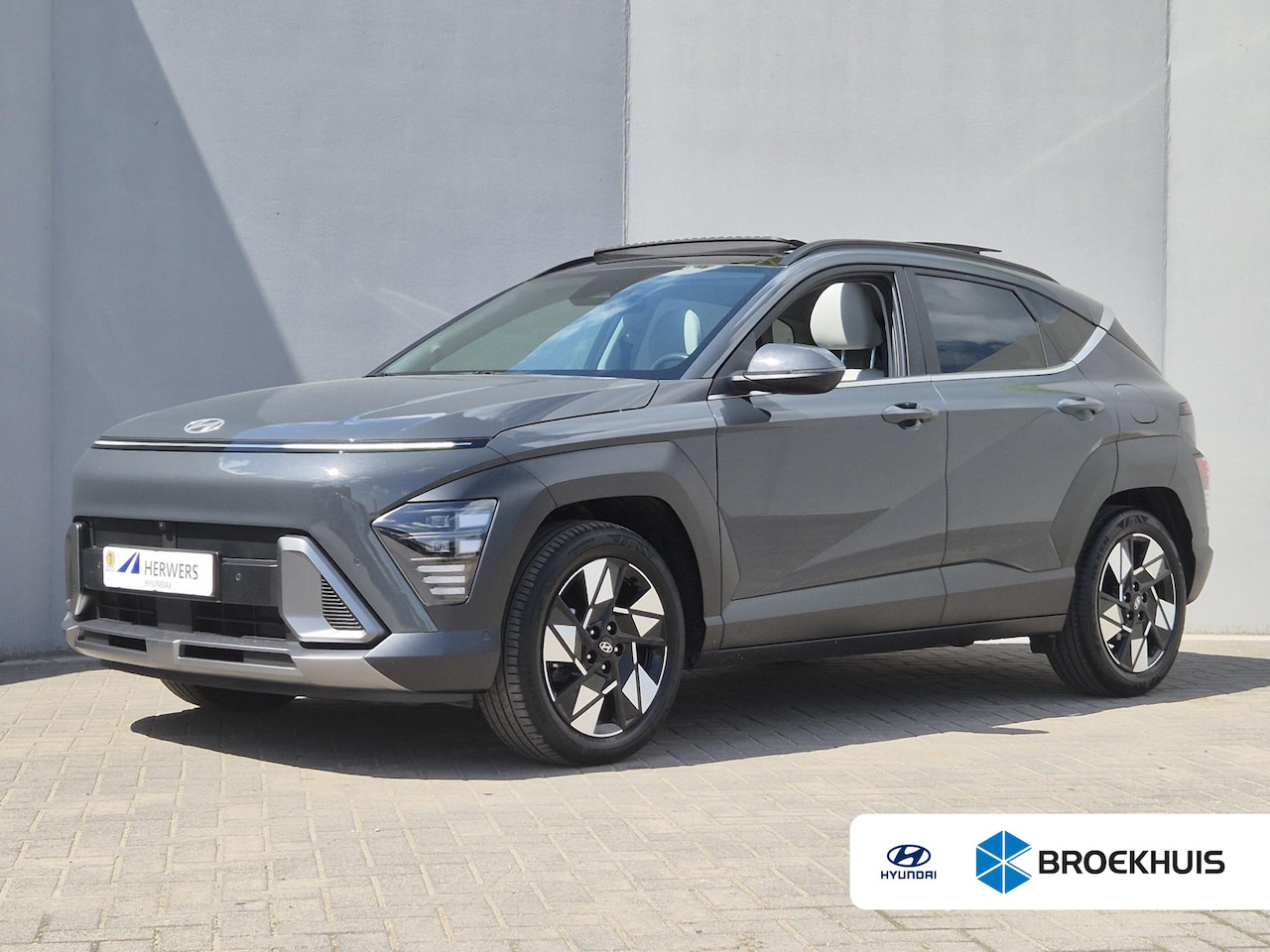 Hyundai Kona - 1.6 GDI HEV Premium Sky | 18-inch lichtmetalen velgen met 215/55 R18-banden | Apple Carpla - AutoWereld.nl