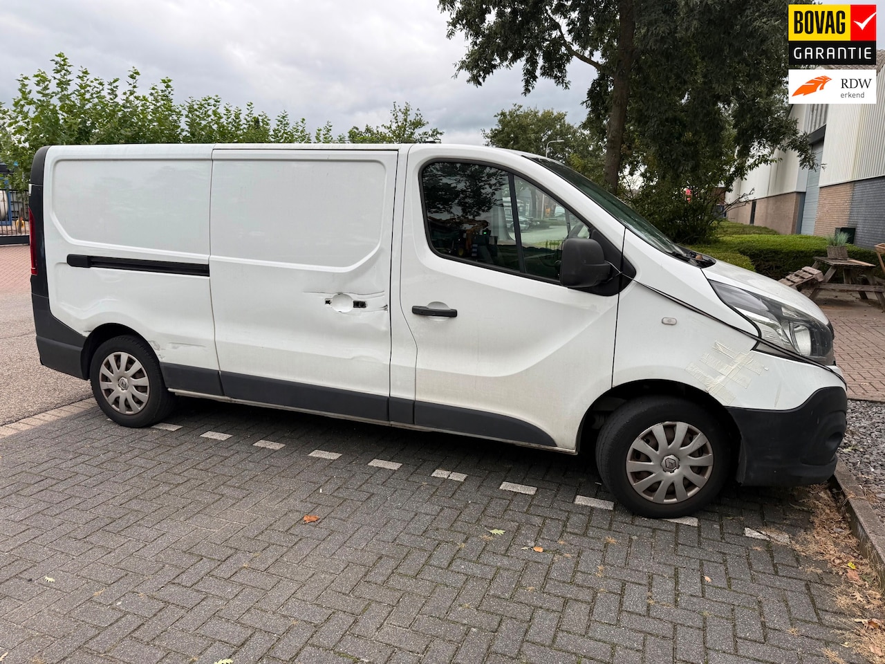 Renault Trafic - 1.6 dCi T29 L2H1 WIT ‘15 AC ROMMELIGE BUS 2X SCHUIF - AutoWereld.nl