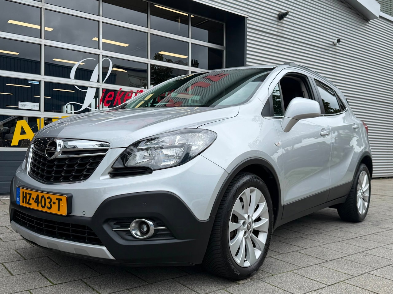 Opel Mokka - 1.4 T Edition - Navigatie I Airco I Sport velgen I PDC I 94.000 KM Dealer onderhouden - AutoWereld.nl