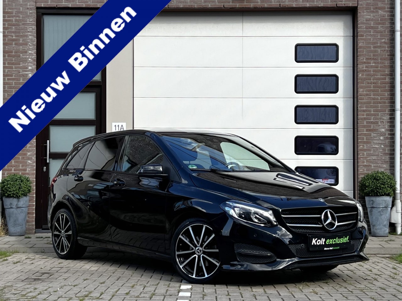 Mercedes-Benz B-klasse - 180 Business Solution AMG Upgrade Edition | Airco | Navigatie | Achteruitrijdcamera | Spor - AutoWereld.nl