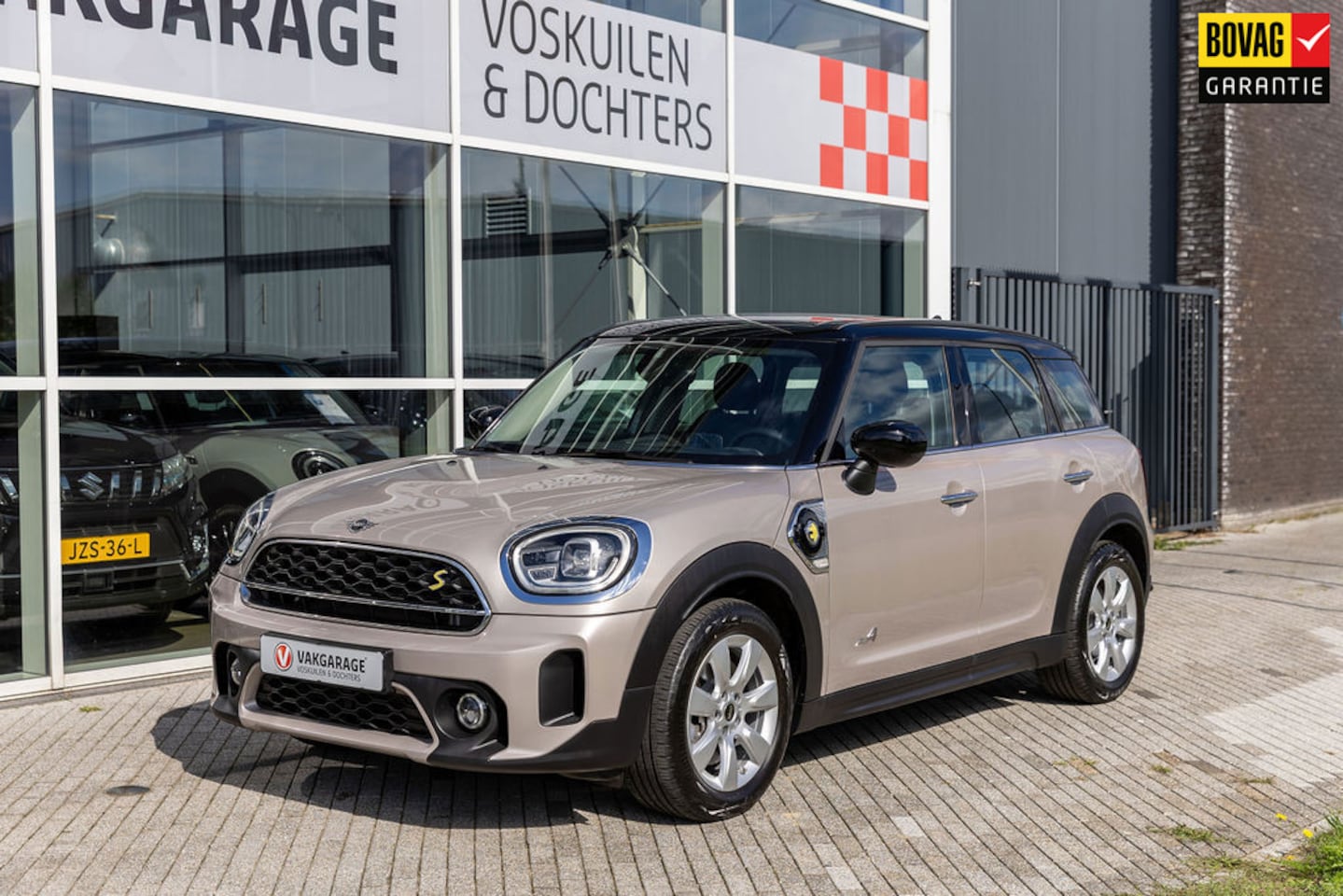 MINI Countryman - 1.5 Cooper S E ALL4 Business Design Rose PHEV - AutoWereld.nl