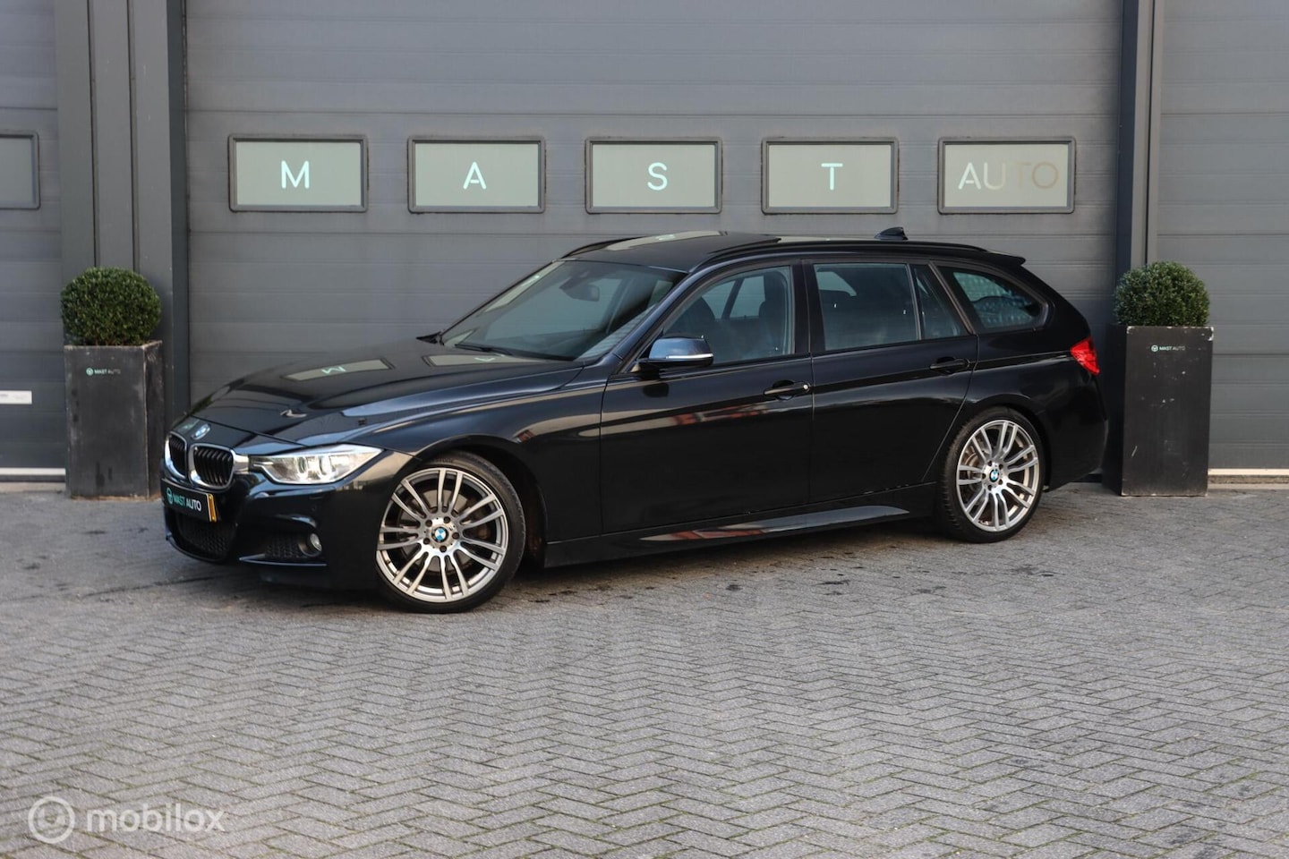 BMW 3-serie Touring - 328i High Executive 328i High Executive - AutoWereld.nl