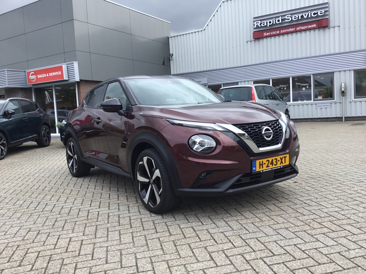 Nissan Juke - 1.0 DIG-T Tekna Sound&Ride 19" - AutoWereld.nl