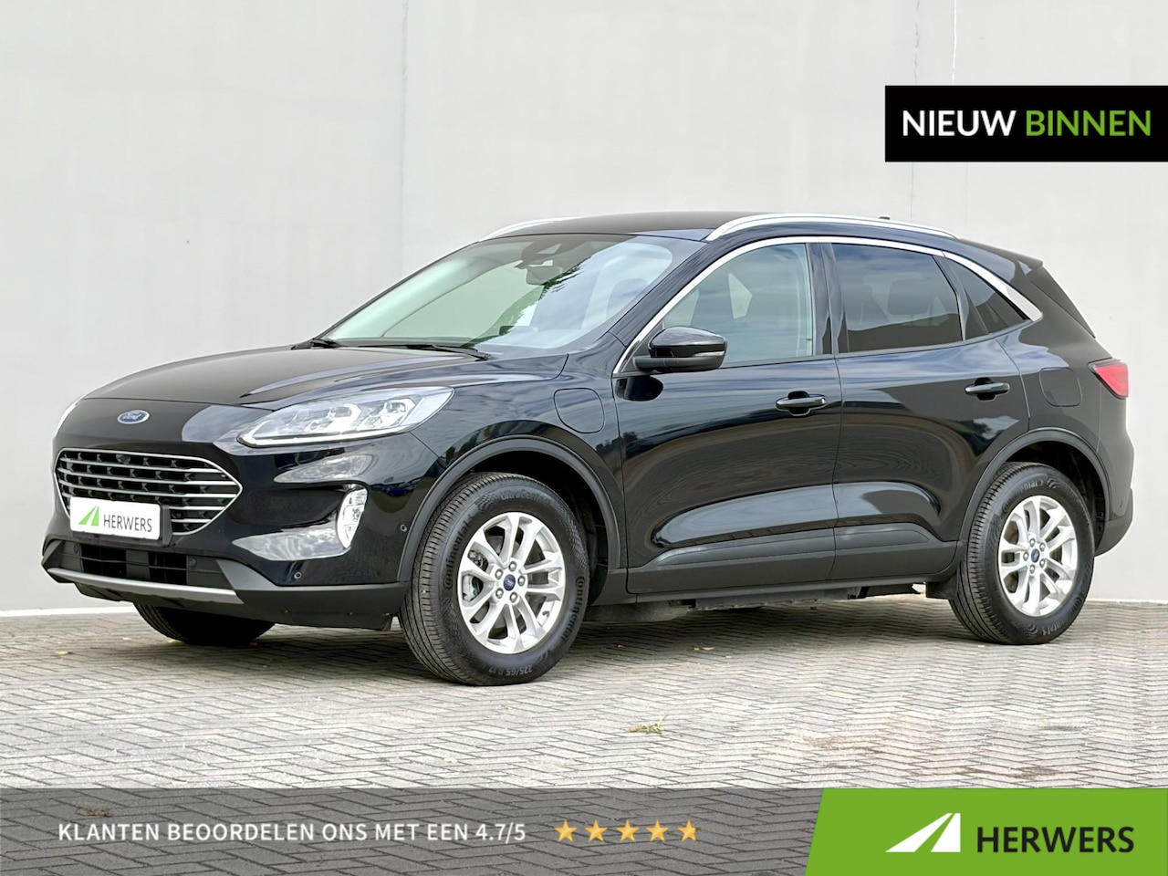 Ford Kuga - 2.5 PHEV Titanium / Dealer Onderhouden / Trekgewicht 1.500 KG / Stoelverwarming / Verwarmd - AutoWereld.nl