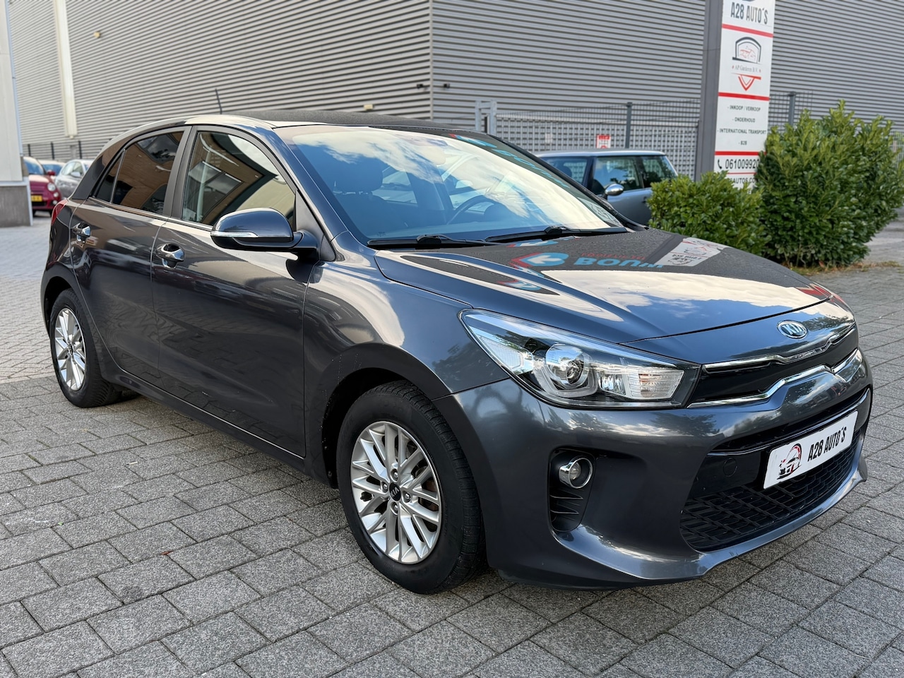 Kia Rio - 1.2 CVVT ComfortPlusLine Navigator|Cruise contr| CarPlay|Achteruitrij camera - AutoWereld.nl