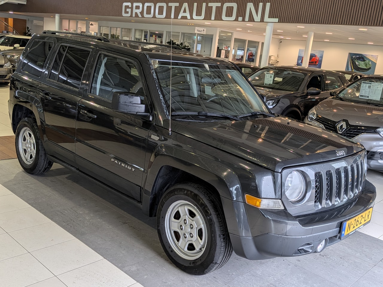 Jeep Patriot - 2.4 Sport Liberty Airco, Cruise Control, Stuurbekrachtiging - AutoWereld.nl