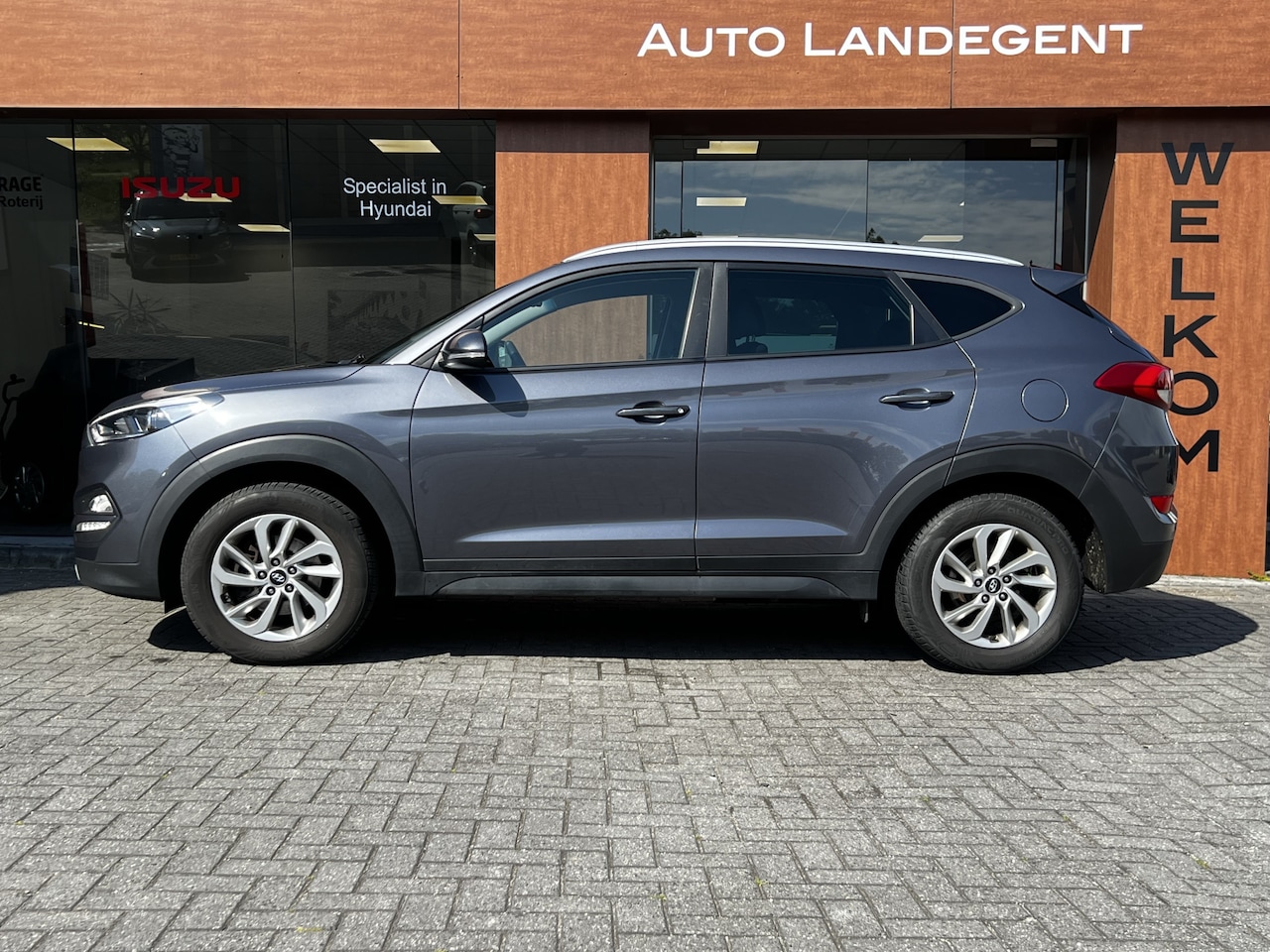 Hyundai Tucson - 1.6 GDi Anniversary Edition | Radio | Bluetooth | Cruise control | NAV | Stoelverwarming | - AutoWereld.nl