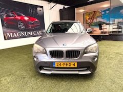 BMW X1 - 18i 5D NAP Airco Navi Trekhaak Parkeersensoren Elek.ramen Velgen