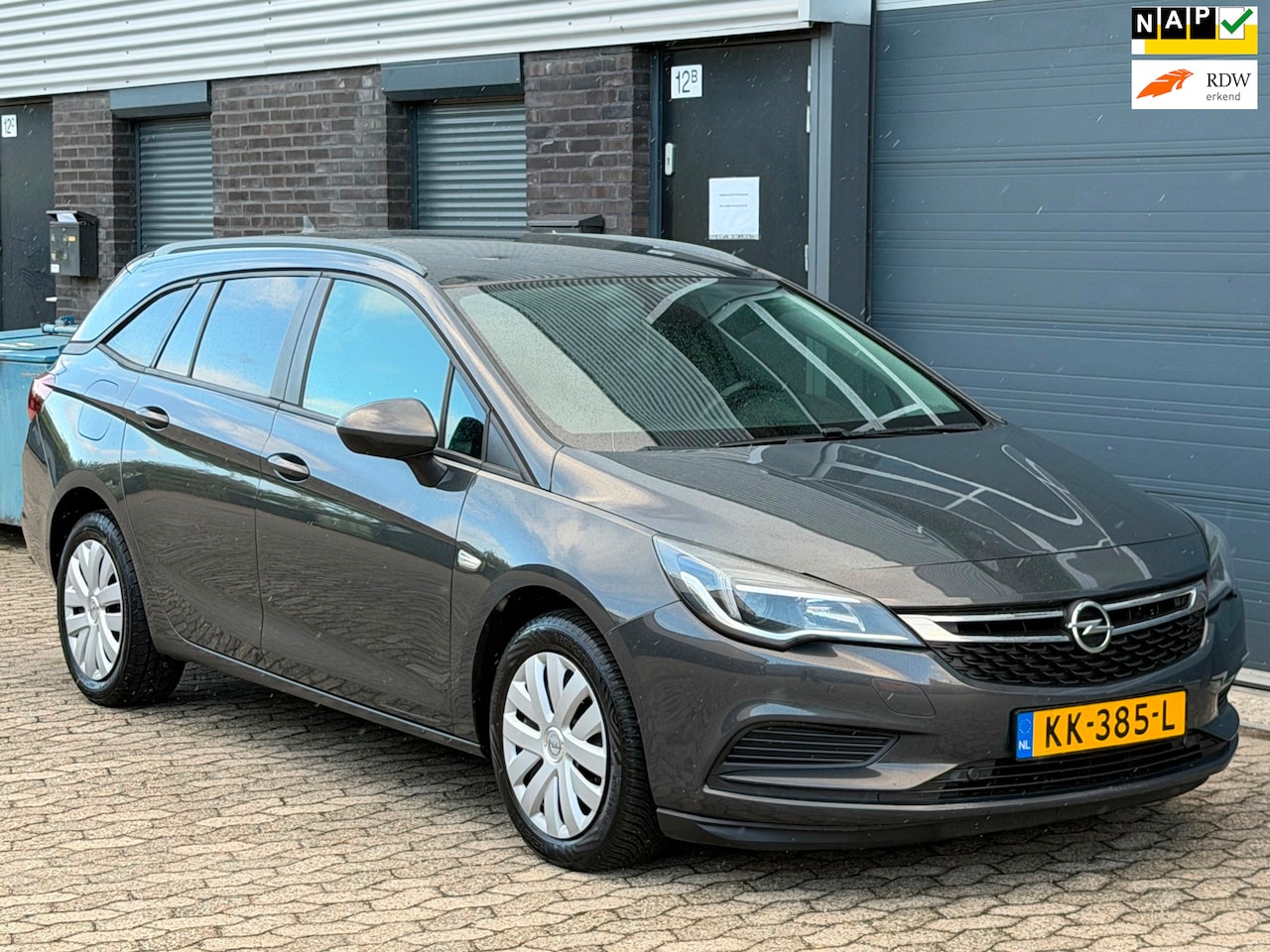 Opel Astra Sports Tourer - 1.6 CDTI Edition NAVI CLIMA PDC CAMERA TREKHAAK - AutoWereld.nl