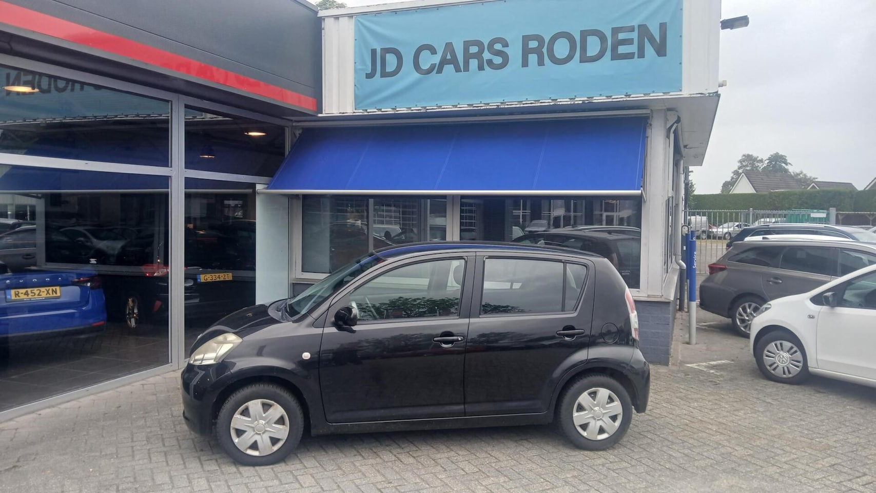 Daihatsu Sirion 2 - 1.0-12V Premium! Luxe! Lage km! let op! - AutoWereld.nl