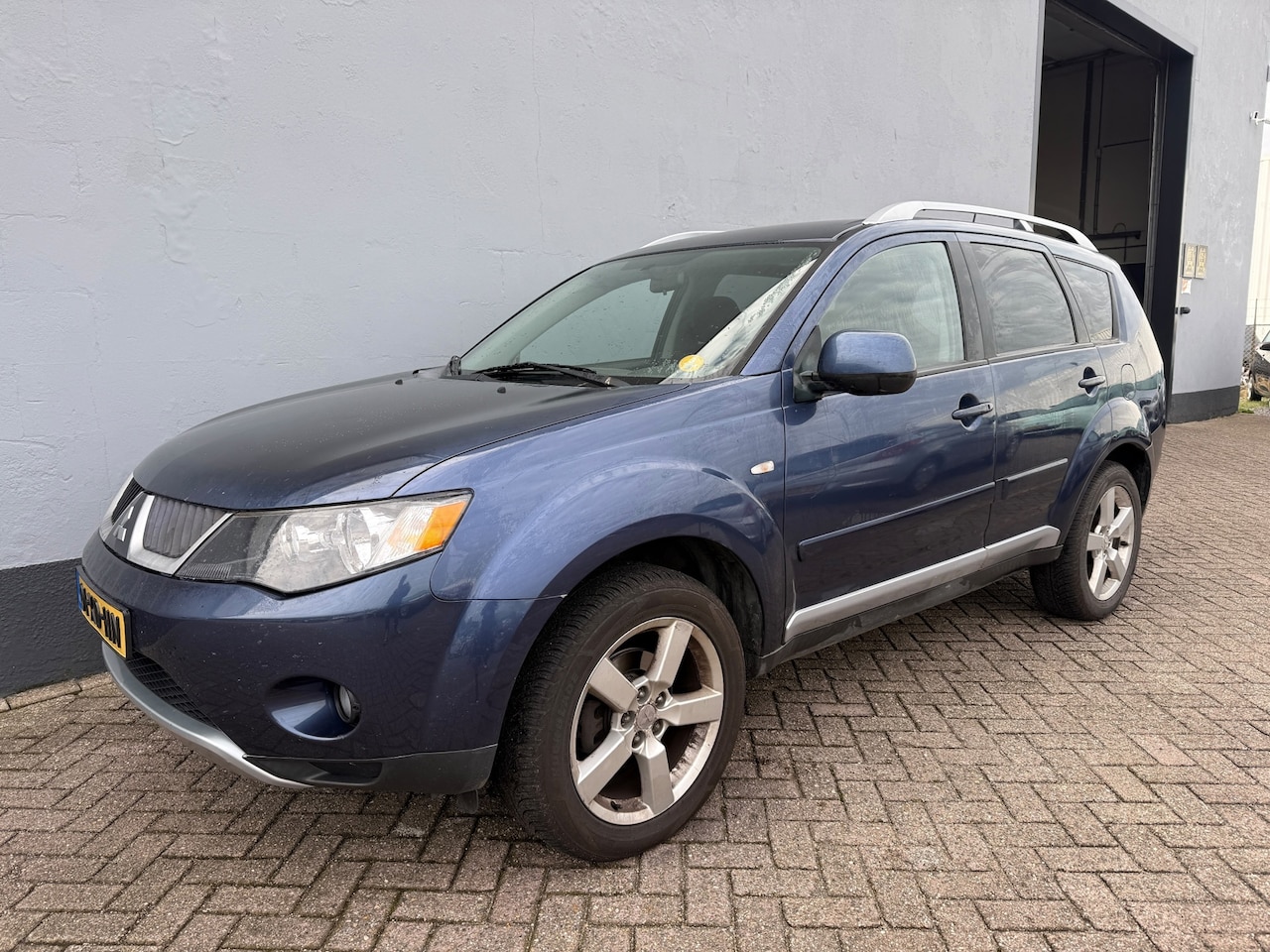Mitsubishi Outlander - 2.0 DI-D Intense+ 7 Pers. Trekhaak - AutoWereld.nl