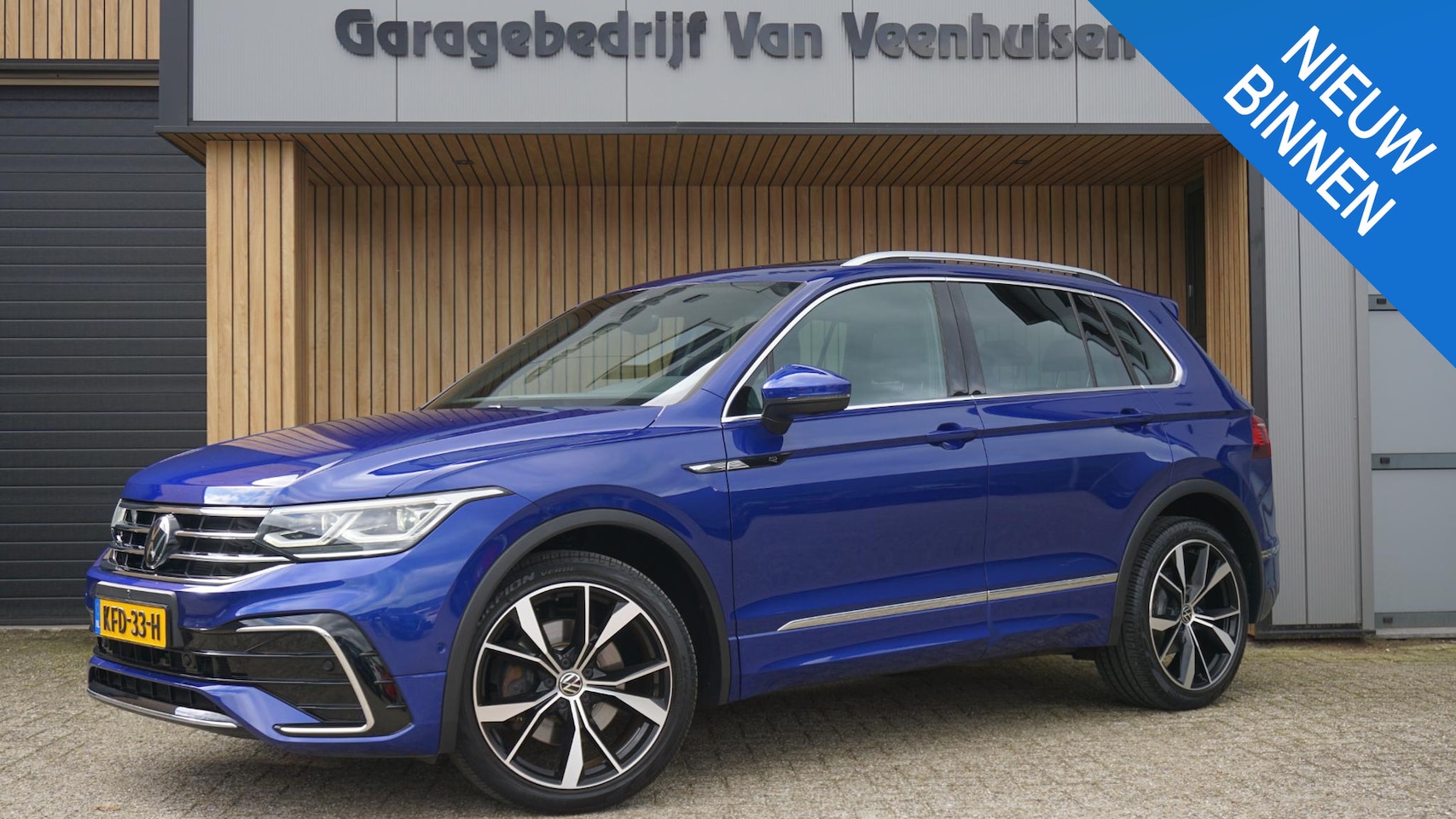Volkswagen Tiguan - 2.0 TSI 190pk 4Motion DSG 3-R-Line Pano.Dak Elek.Trekhaak 20inch LM 360-View *Lapiz Blue M - AutoWereld.nl