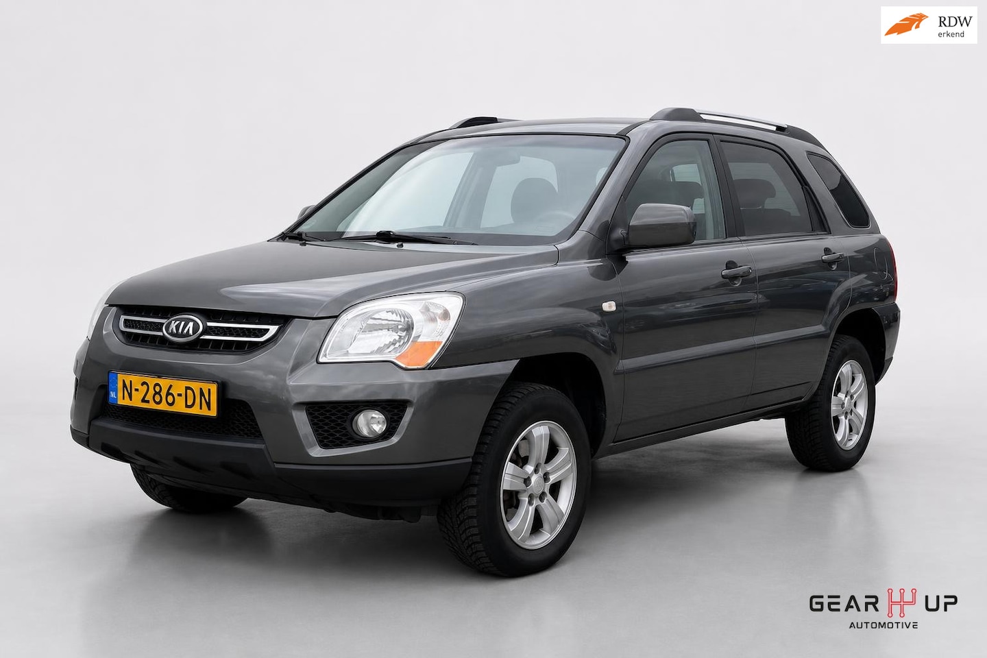 Kia Sportage - 2.0 CVVT X-clusive AIRCO|CRUISE|LEER|LM|TREKH| - AutoWereld.nl
