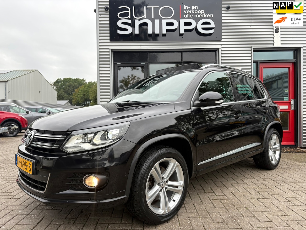 Volkswagen Tiguan - 1.4 TSI R-Line Edition 150 PK -LED-OPEN DAK-VOLLERDER-DAB+-LANE ASSIST-ORIGINEEL NEDERLAND - AutoWereld.nl