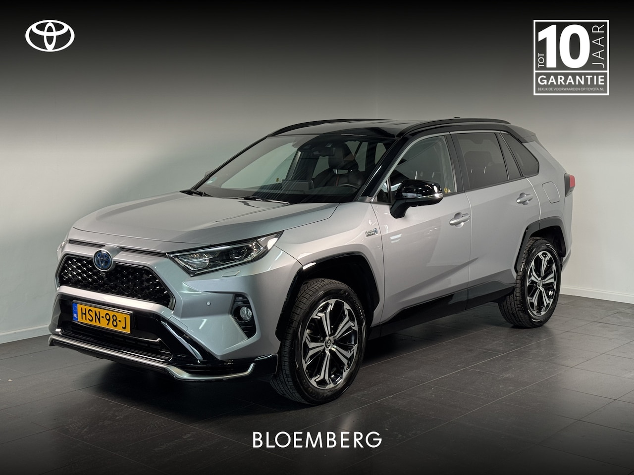 Toyota RAV4 - 2.5 Plug-in Hybrid AWD Bi-Tone Plus | Trekhaak | Bearlock | Full option | - AutoWereld.nl