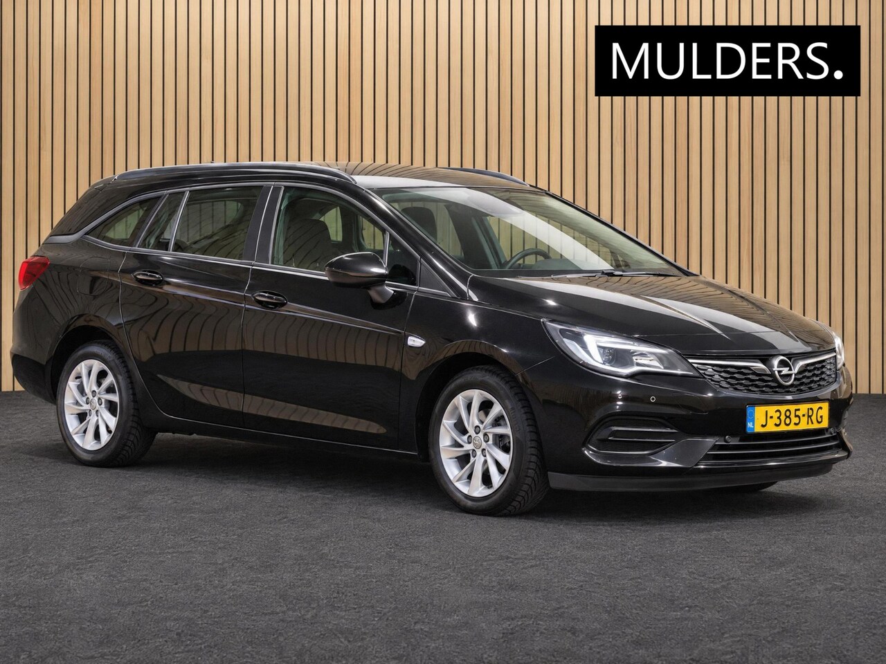 Opel Astra Sports Tourer - 1.4 Edition | Automaat / Cruise / Parkeersensoren - AutoWereld.nl