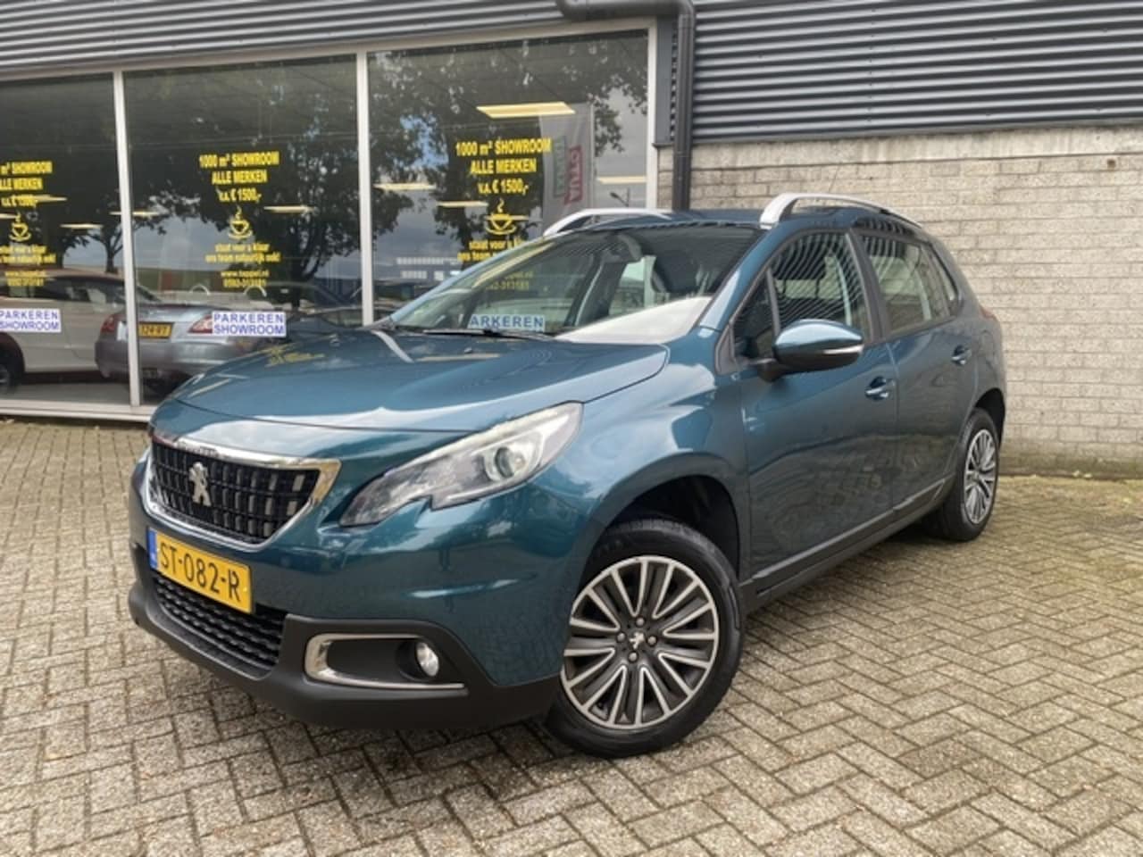 Peugeot 2008 - 1.2 PureT. Blue Lion - AutoWereld.nl