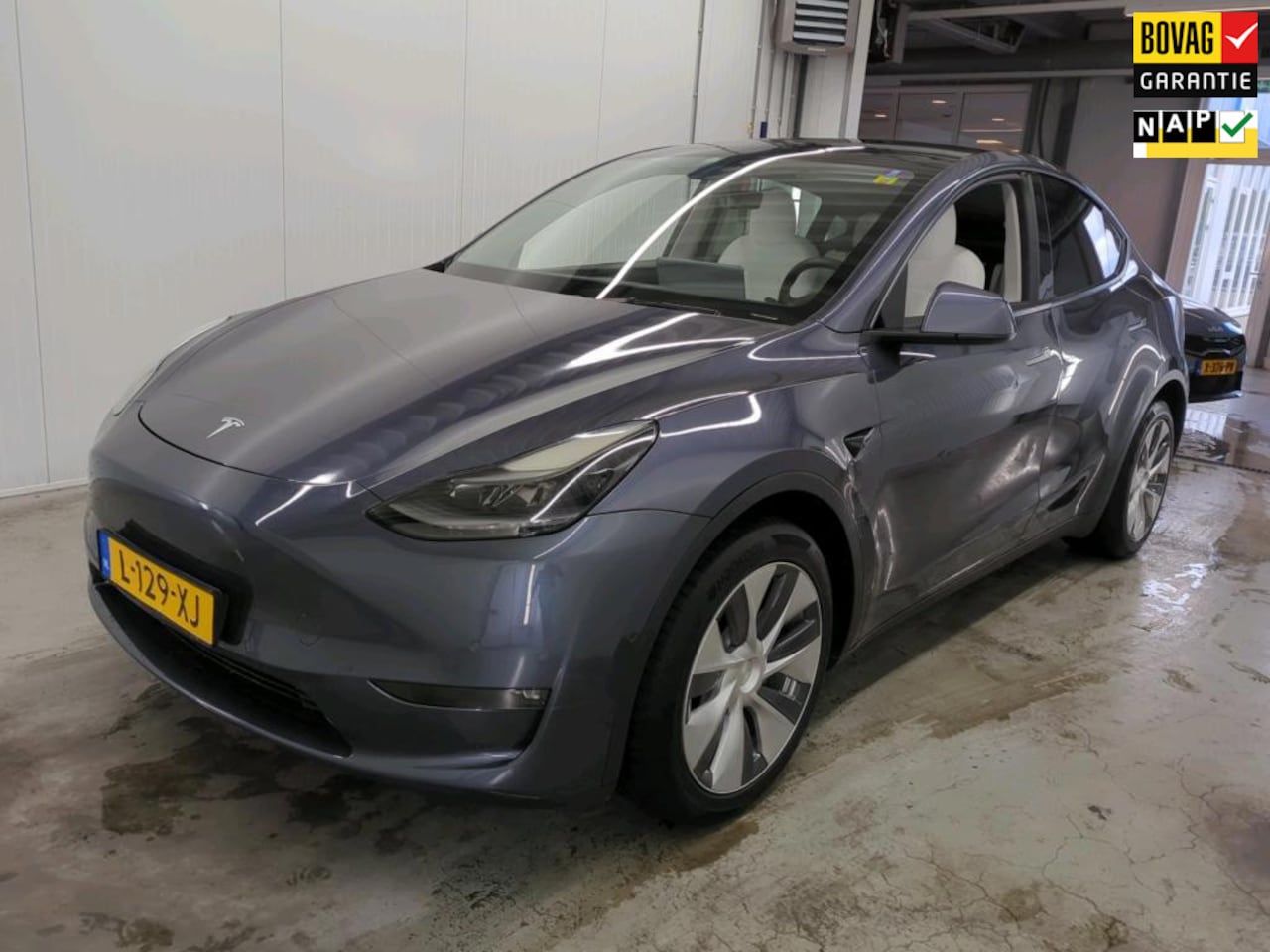 Tesla Model Y - Long Range AWD 75 kWh TREKHAAK WIT LEER - AutoWereld.nl