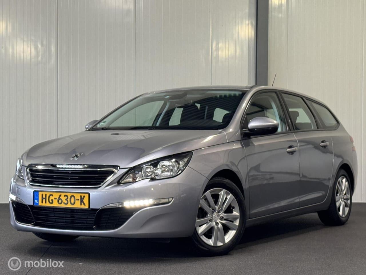 Peugeot 308 SW - 1.6 BlueHDI Blue Lease Pack [ NAP trekhaak navi ] - AutoWereld.nl