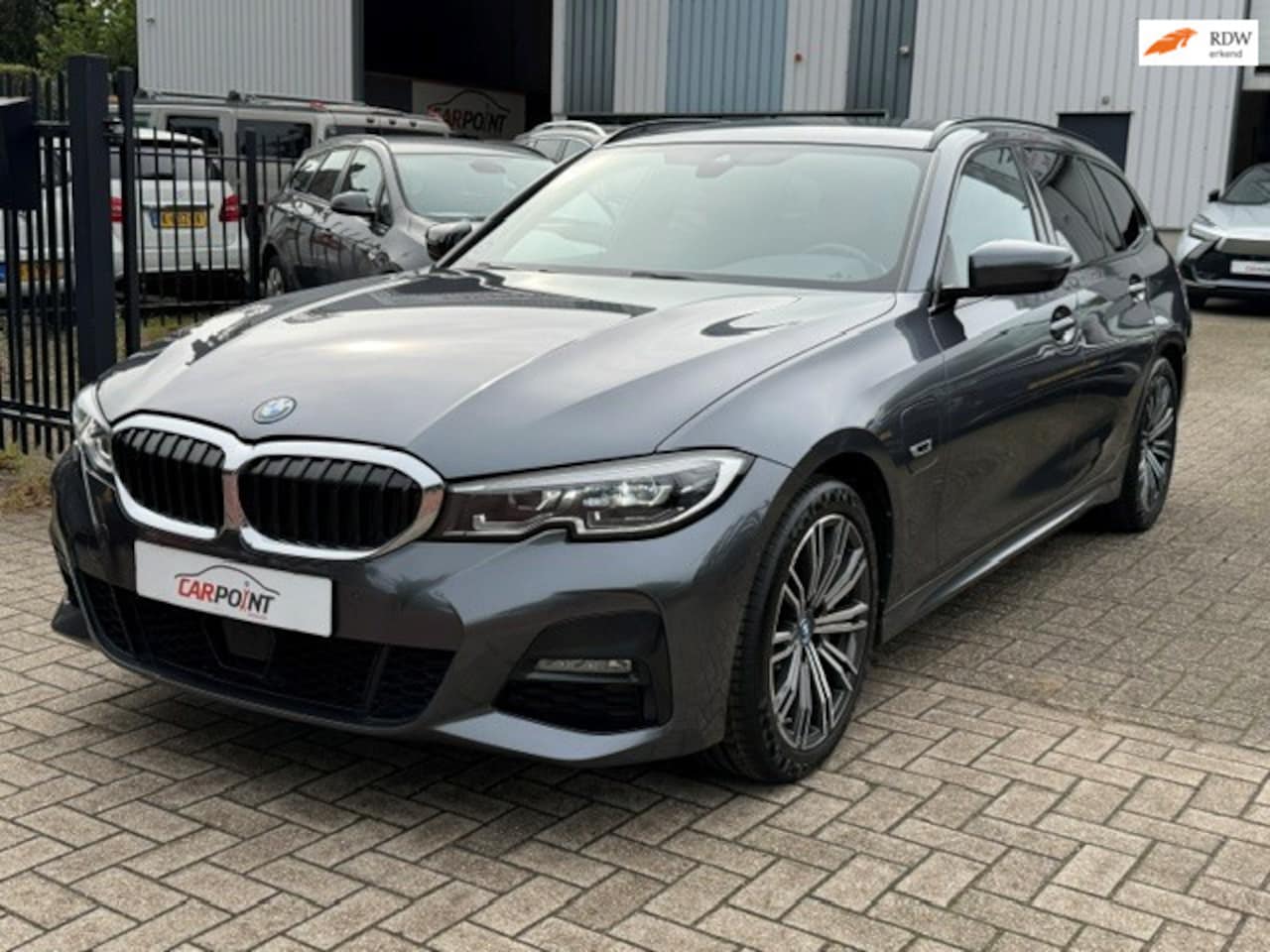 BMW 3-serie Touring - 330e Executive M Sport Leer Navi Clima Cruise - AutoWereld.nl