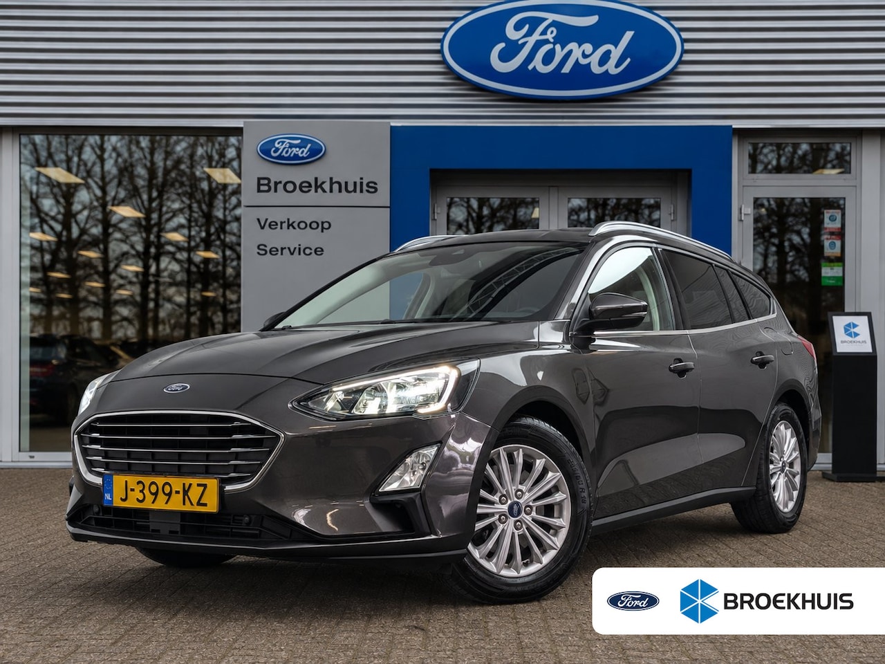 Ford Focus Wagon - 1.0EB Hybrid Titanium X Business | NL-AUTO! | 1E EIGENAAR! | TREKHAAK | CAMERA | CRUISE | - AutoWereld.nl