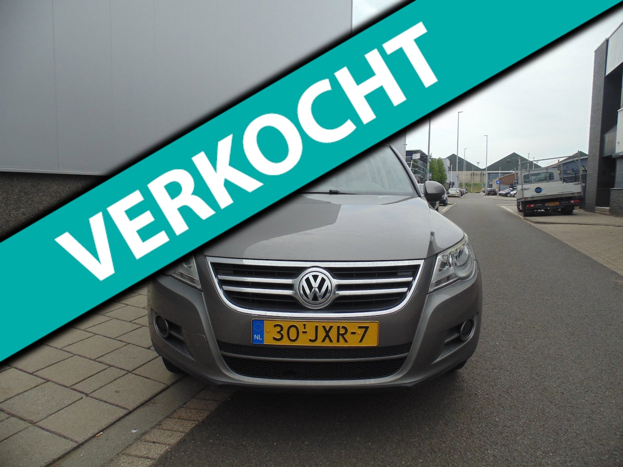 Volkswagen Tiguan - 1.4 TSI Comfort&Design Met airco navi trekhaak - AutoWereld.nl