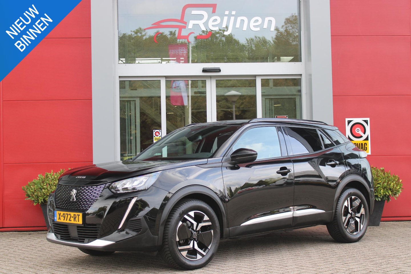 Peugeot 2008 - 1.2 100PK ALLURE PACK | AFNEEMBARE TREKHAAK | NAVIGATIE | STOEL VERWARMING | ALL SEASON BA - AutoWereld.nl