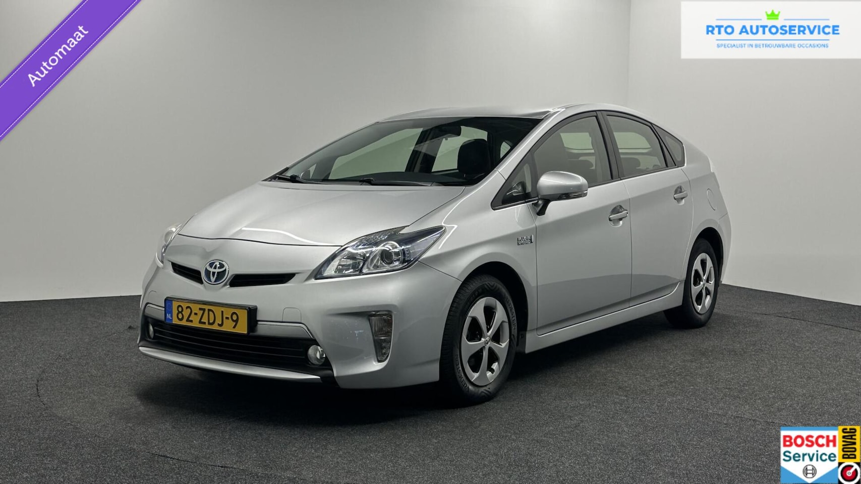 Toyota Prius - 1.8 Plug-in Aspiration LEER NAVI CAMERA CRUISE. - AutoWereld.nl