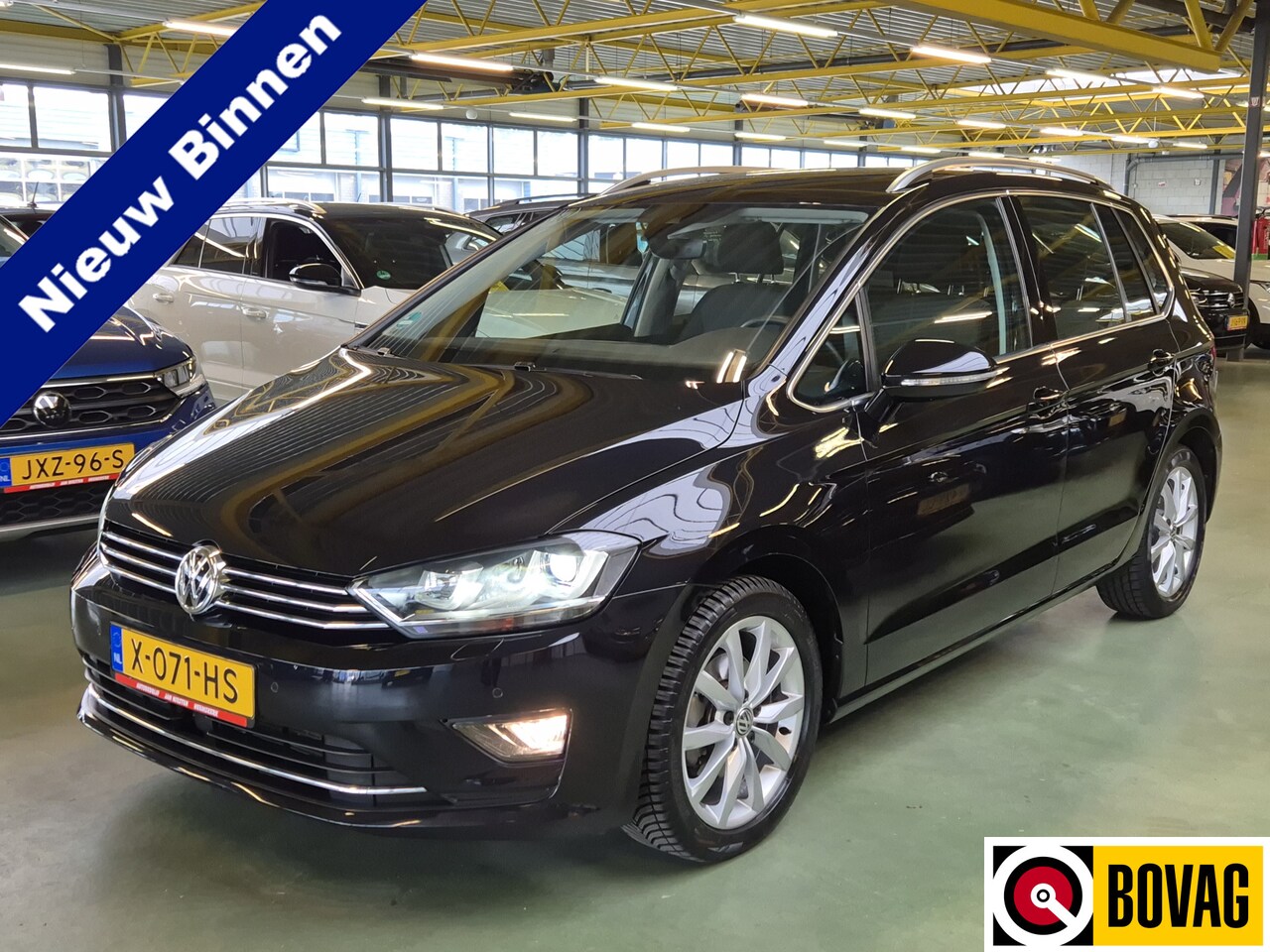 Volkswagen Golf Sportsvan - 1.4 TSI Highline -150pk- Automaat | ErgoActive stoel | Dodehoek sensor | Xenon | Rijklaarp - AutoWereld.nl
