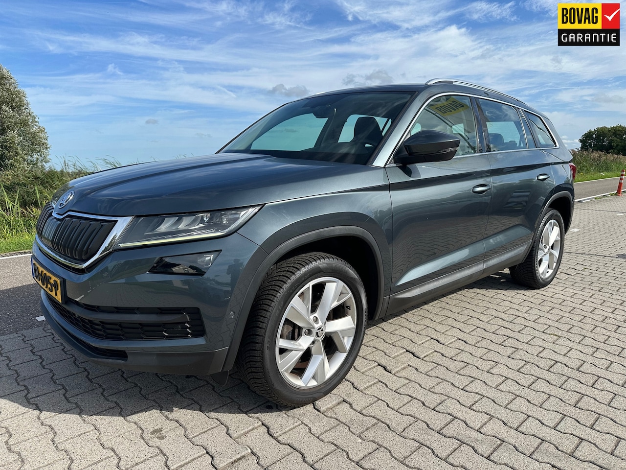 Skoda Kodiaq - 2.0 TSI 4x4 Style Business 7p. 2.0 TSI 4x4 Style Business 7P, Trekhaak, Top View, Leder, Elektrische klep, Carplay, Cruis - AutoWereld.nl