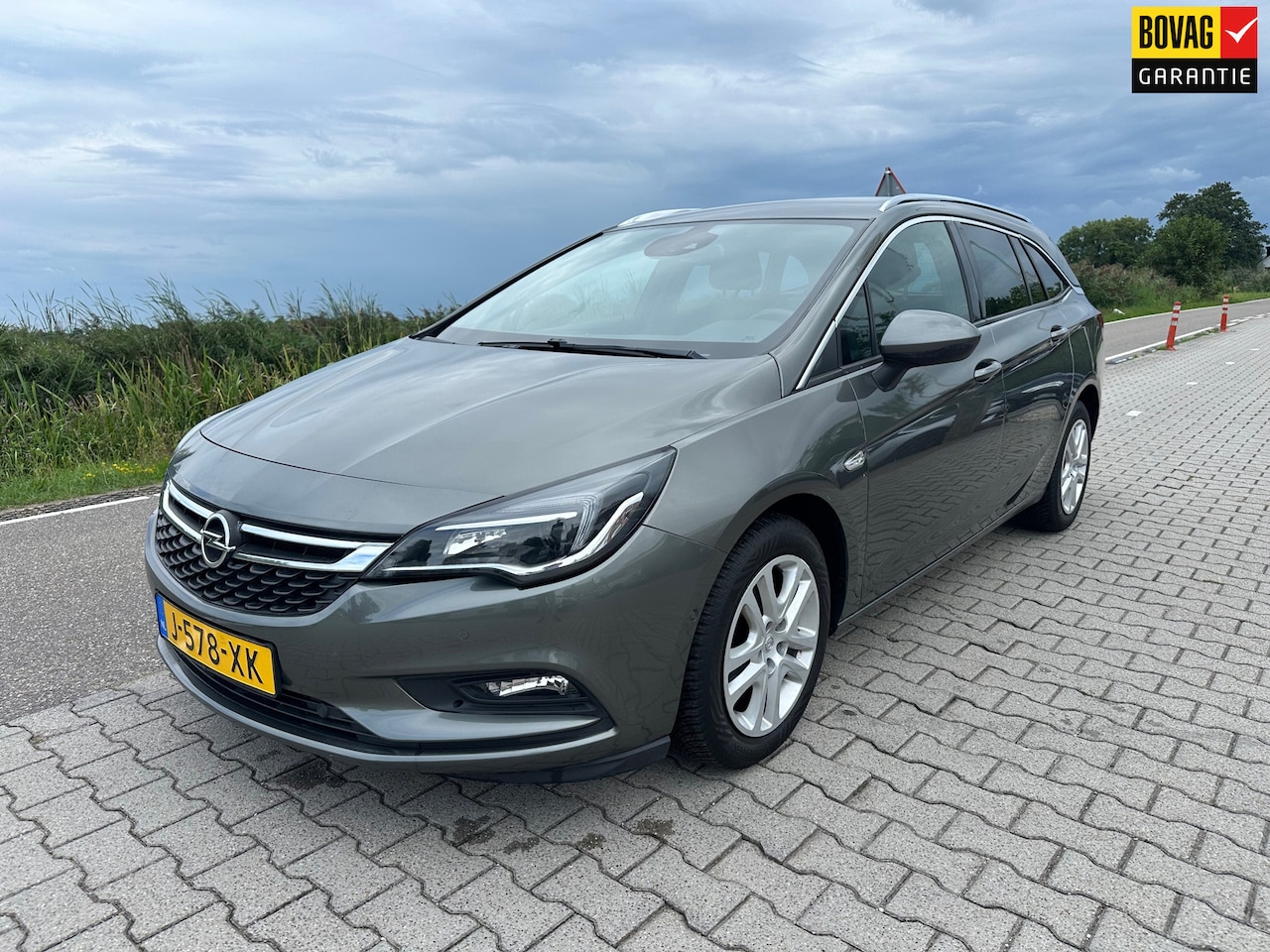 Opel Astra Sports Tourer - 1.4 Turbo Innovation, Carplay, Trekhaak, Camera, Stoel & Stuurverwarming, Cruisecontrol, E - AutoWereld.nl
