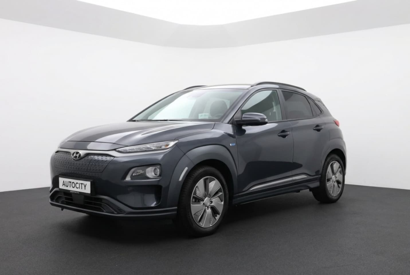 Hyundai Kona Electric - EV Premium 64 kWh 100% SOH Origineel NL | Leder | Stoelventilatie | HUD | Carplay - AutoWereld.nl
